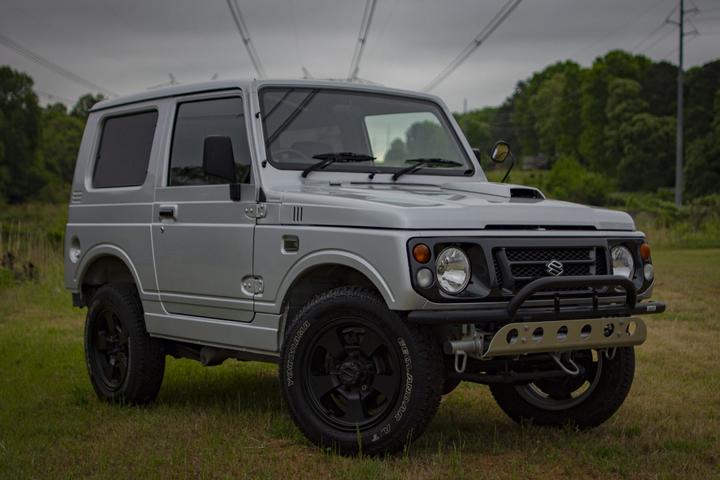 One of ATL-JDM's many JDM Imports / JDM Cars for Sale the 1996 Suzuki Jimny Wild Wind SOLD